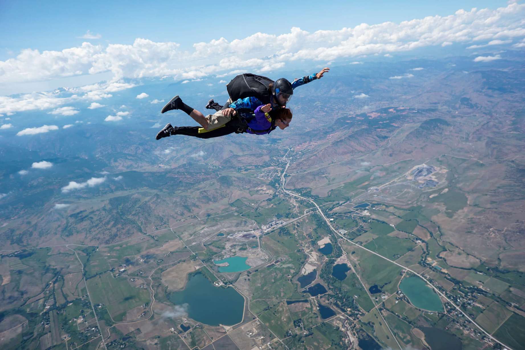 Two people going skydiving in Colorado