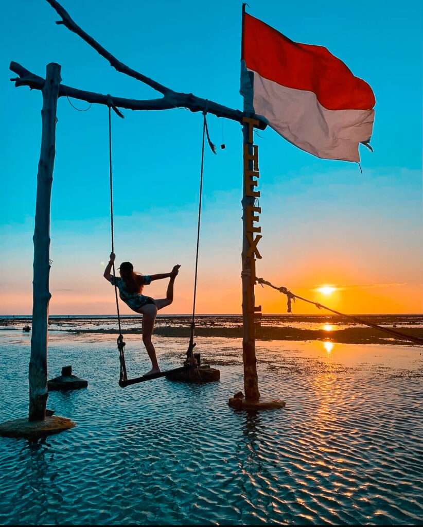Yoga at sunset in the Gili Islands, Indonesia