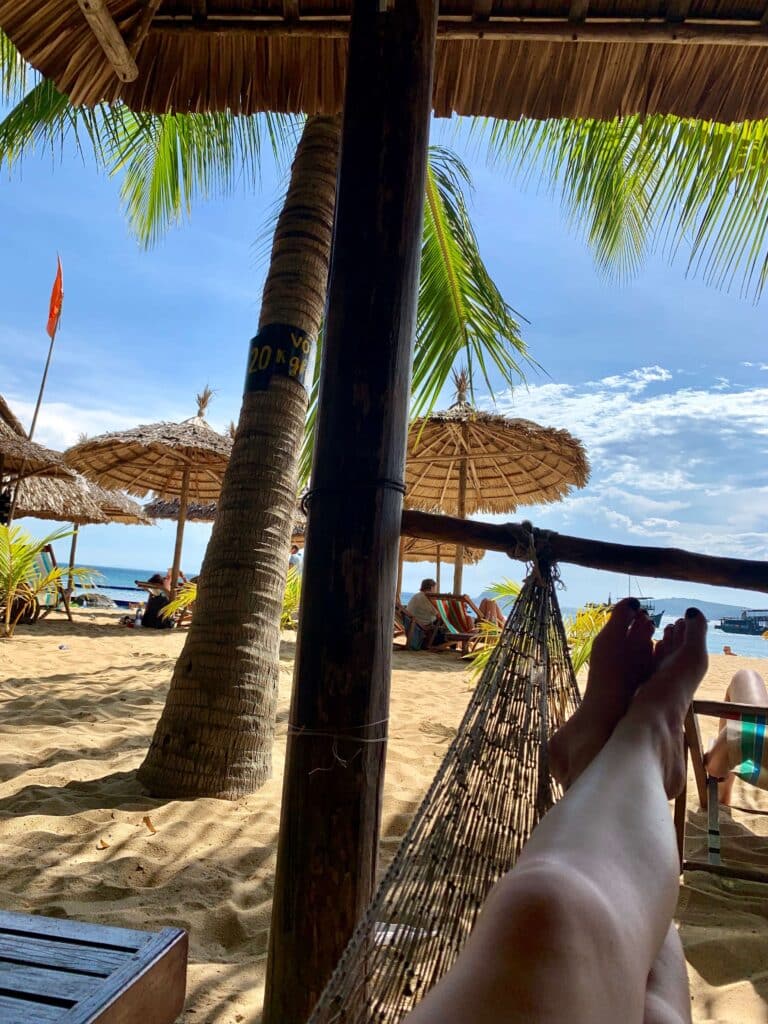 Two feet on a beach in Vietnam