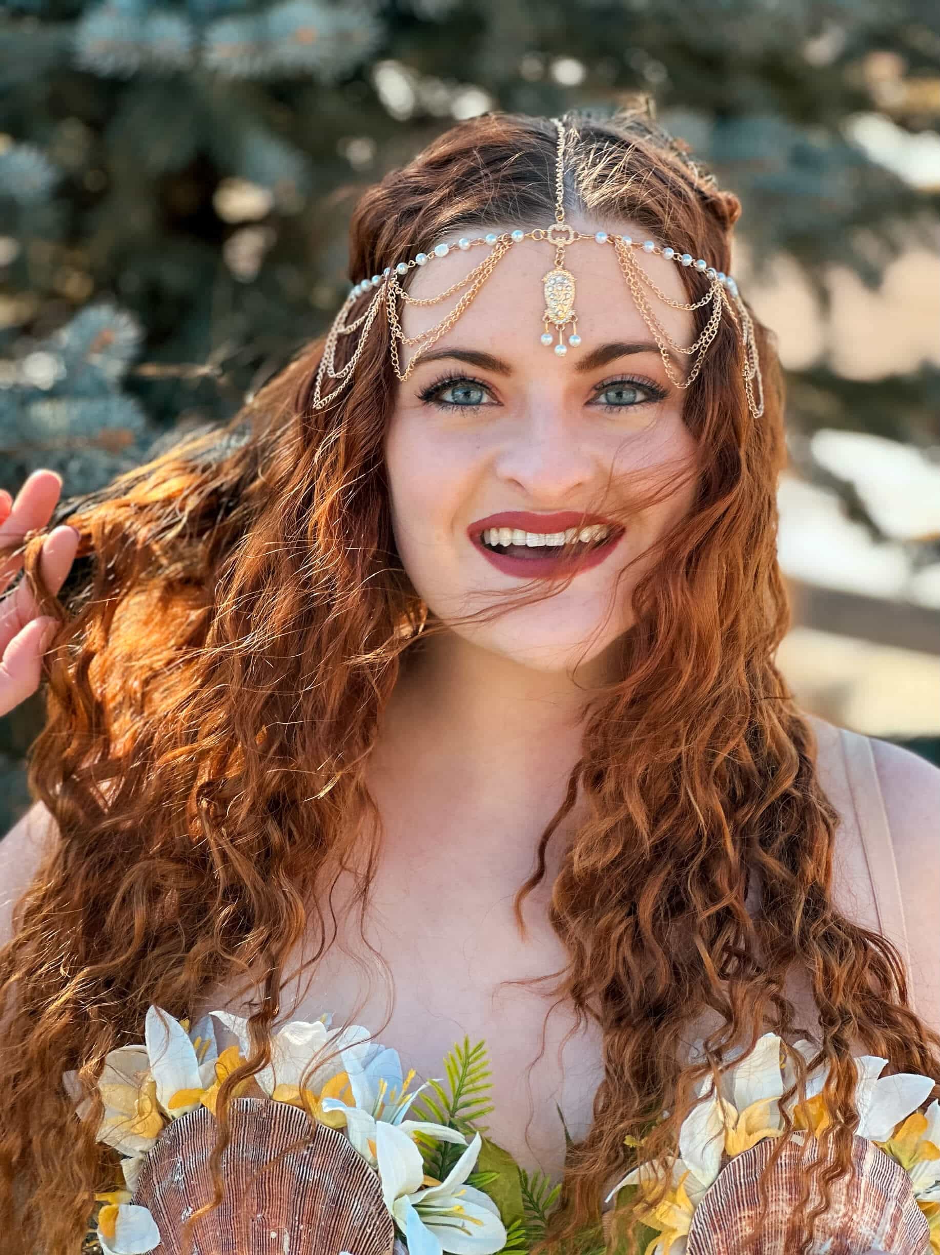 a red-haired mermaid headshot