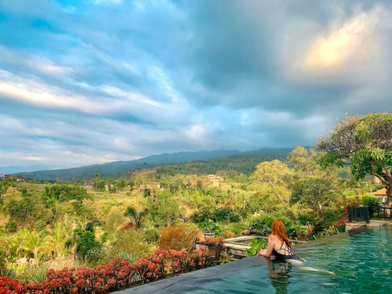 Girl in a pool at Private villa in Ubud Bali Indonesia
