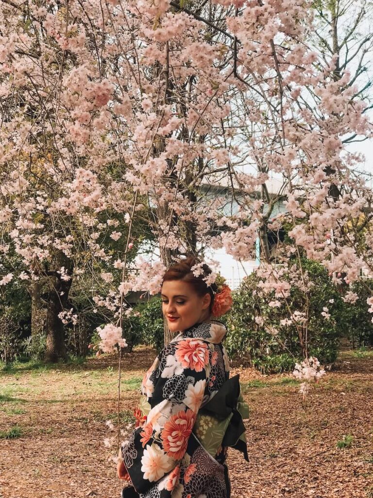 Girl in kimono with cherry blossoms
