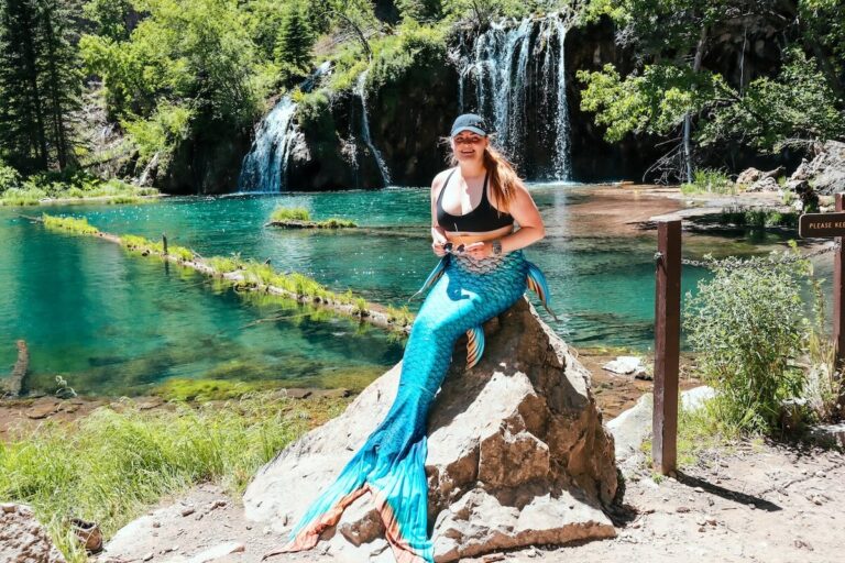 The bucket list mermaid posing in front of Hanging Lake in Colorado