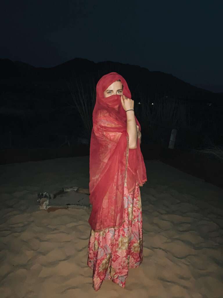 Girl in Pushkar in pink sari in India