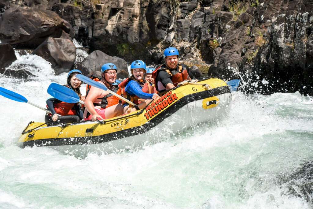 Going down the rapids of Tully River