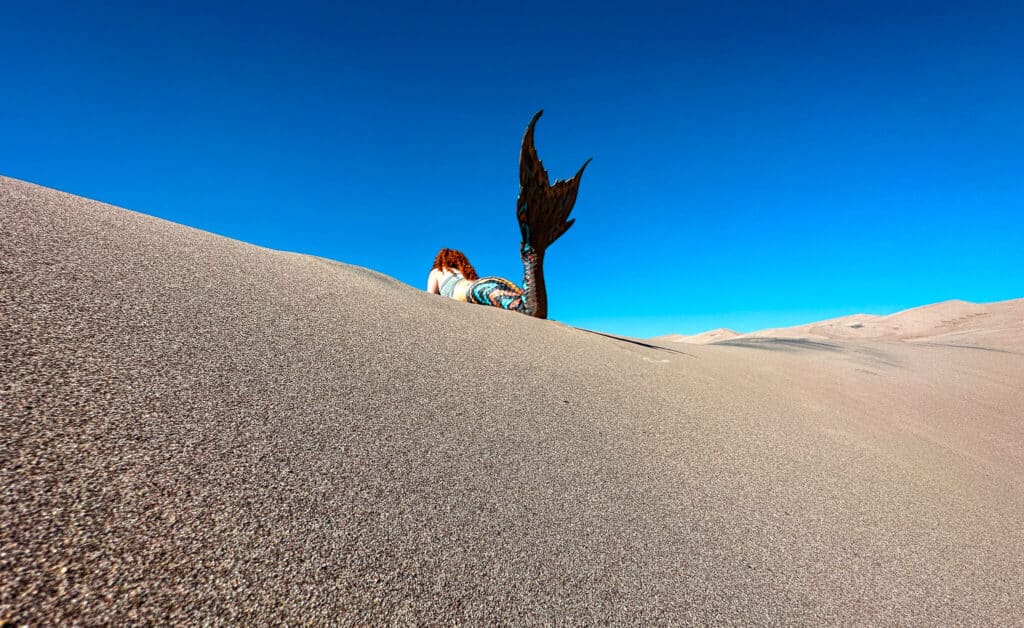 A mermaid on the sands dunes in Colorado
