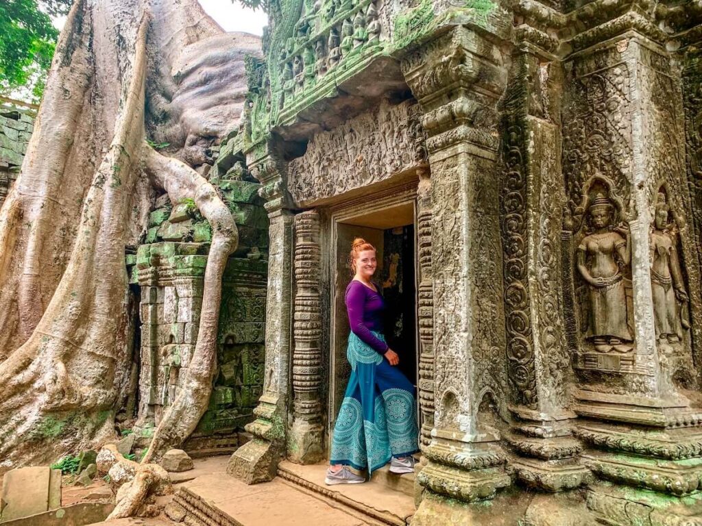 Girl going through temples in Cambodia, angkor wat