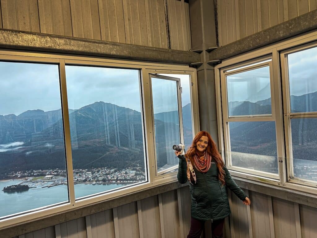Red-haired girl at the top of the Goldbelt tram in Juneau, Alaska