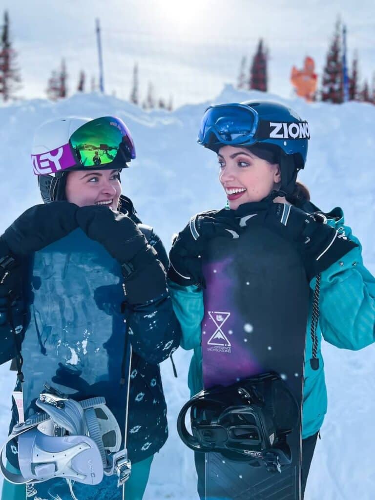 two best friends snowboarding in colorado