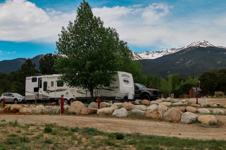 RVs parked in front of the mountains at Arrowhead Point Resort