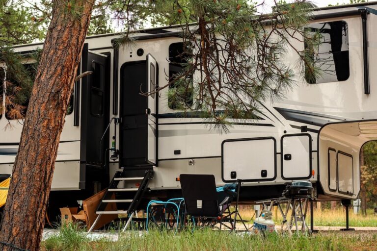 Trees covering an RV spot at an RV Park in Elizabeth