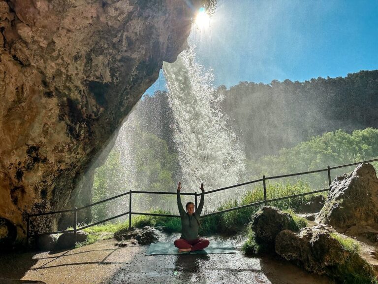 Yoga pose sitting behind Rifle Falls