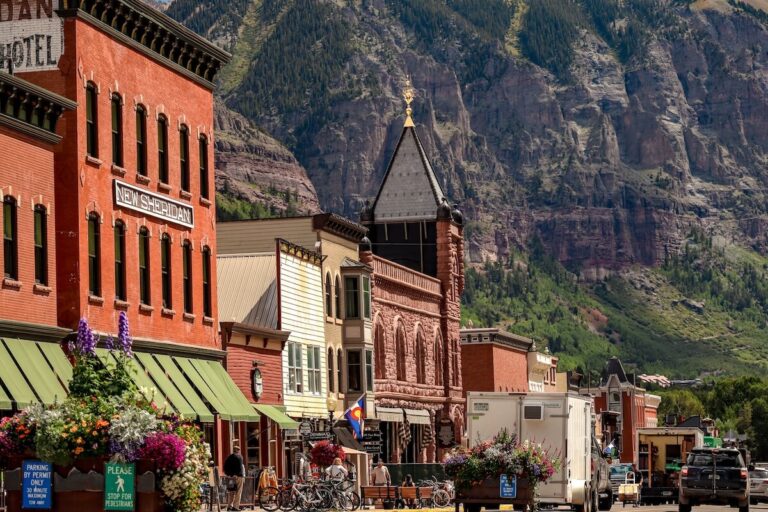 View of downtown Ouray with the mountains in the background for an Ouray Bucket List.