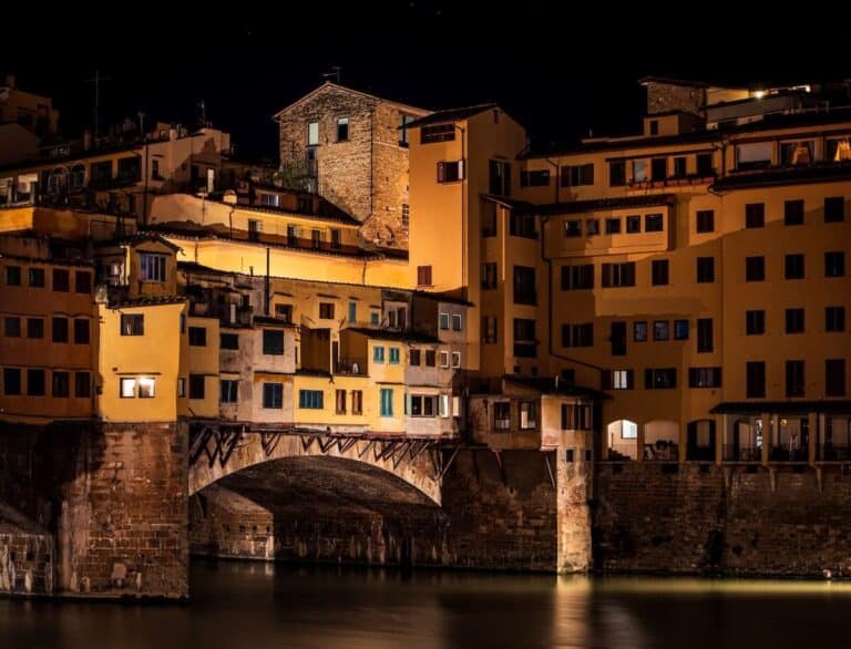 Ponte vecchio at night in Florence, Italy to demonstrate Florence photography