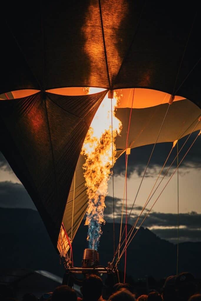 A close up of a flame lighting up a hot air balloon in Albuquerque.