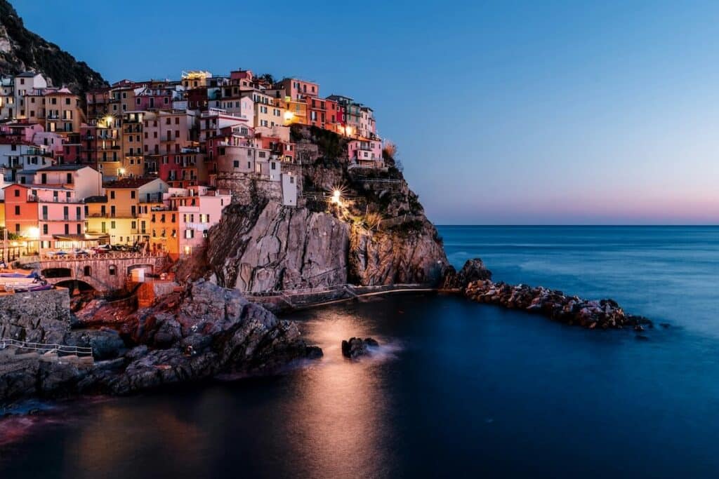 Cinque Terre during blue hour. Photo by Bjorn Snelders on Unsplash